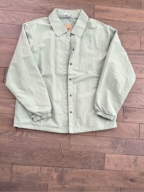 Nike Woman Light Green Windbreaker Jacket